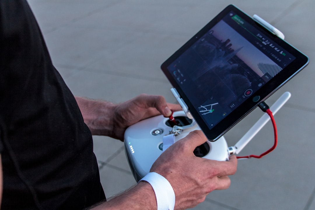 Person holding a controller