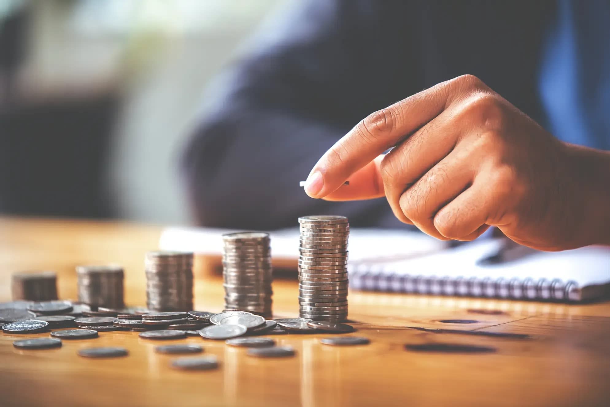 holding-the-money-saving-coin-place-the-coin-on-t-2026-01-08-07-44-09-utc.webp