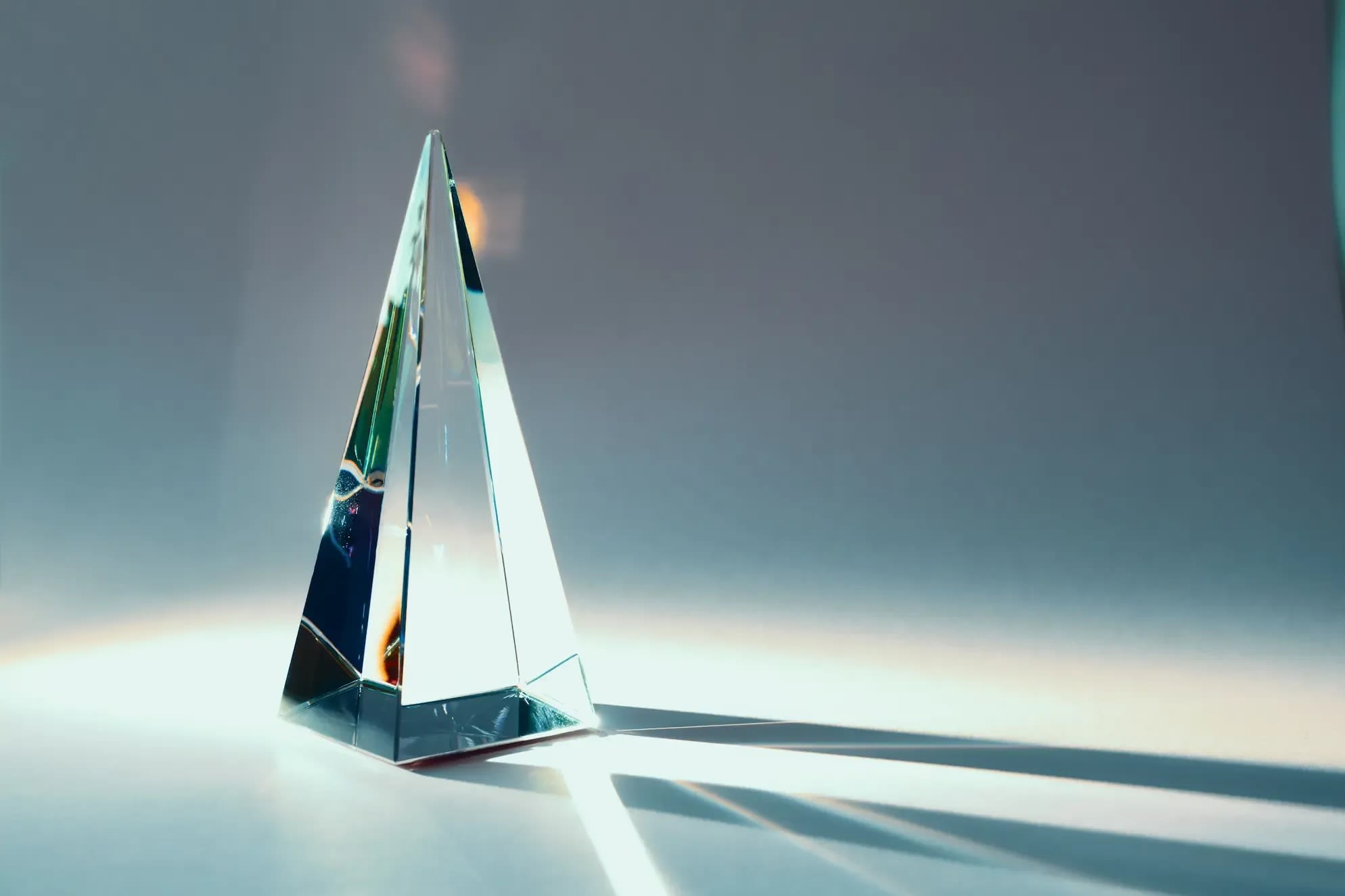 glass-pyramid-prism-with-colorful-sunlight-reflect-2026-03-17-02-30-59-utc.webp