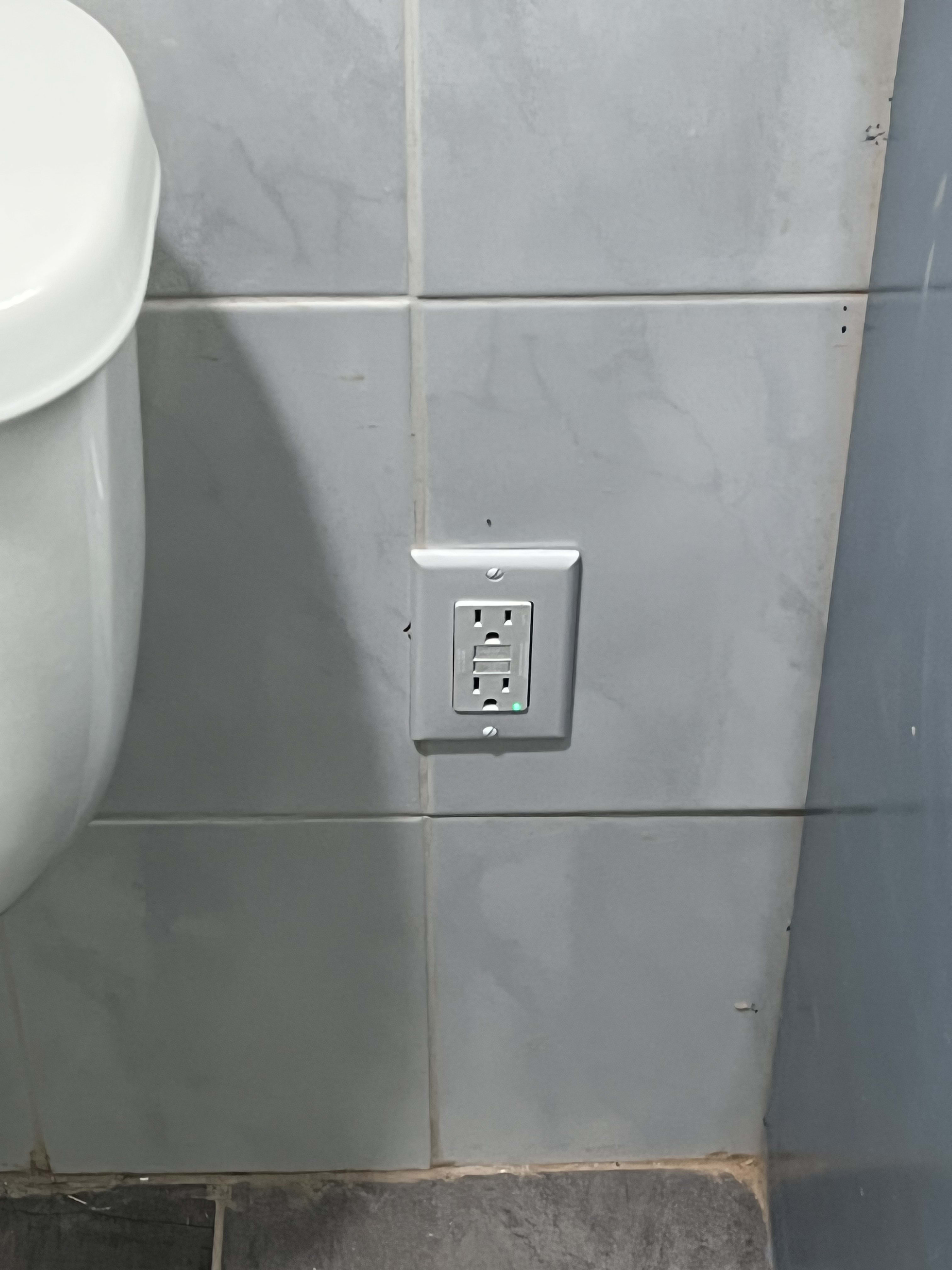 Bathroom GFCI outlet replacement for hair dryer use. Replaced and corrected a bathroom outlet used for a hair dryer with proper GFCI protection for safer daily use.