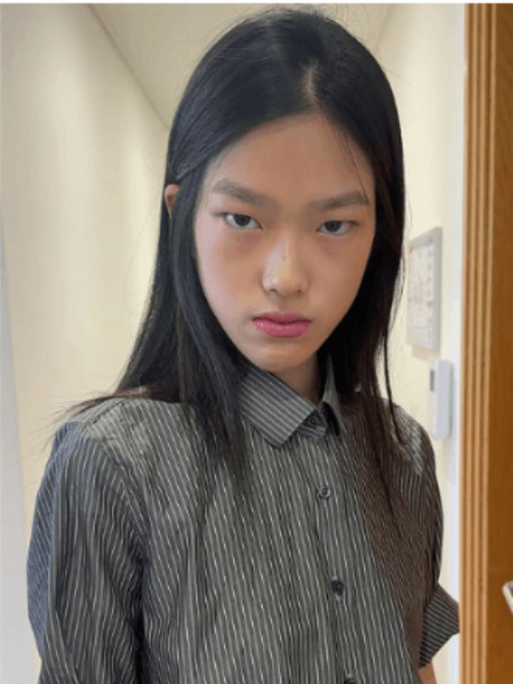 Yuzhu Huang — portrait