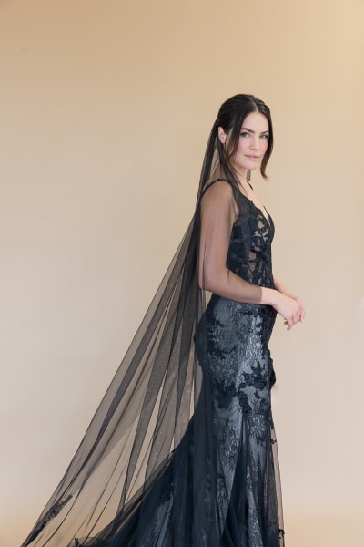 Bride in a custom black wedding dress by Lace & Liberty