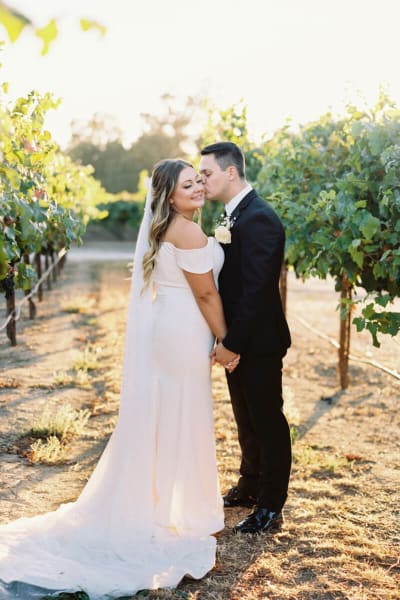 Amanda, a Lace & Liberty bride, in her satin wedding dress