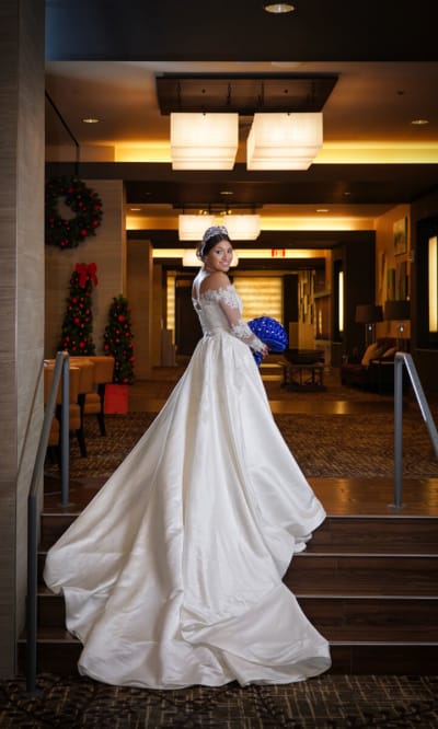 Ashley, a Lace & Liberty bride, in her satin wedding dress