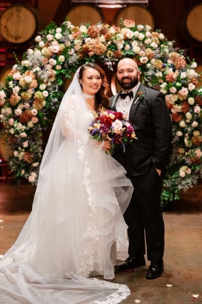 Eliza, a Lace & Liberty bride, in her modest wedding dress