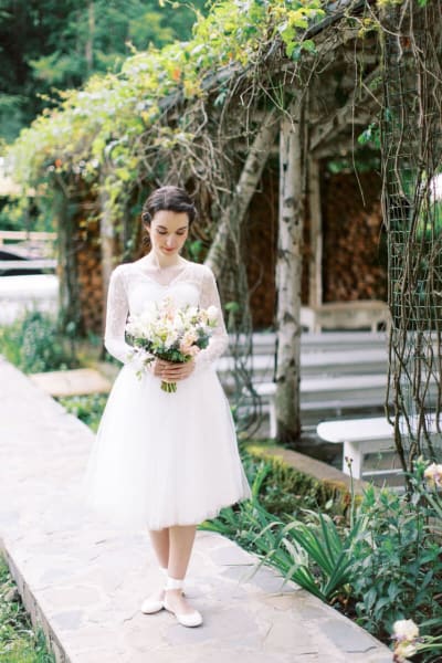 Irina, a Lace & Liberty bride, in her modest wedding dress