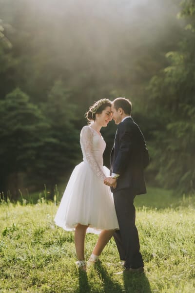 Irina, a Lace & Liberty bride, in her short wedding dress