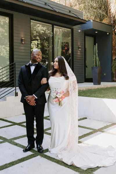 Jada, a Lace & Liberty bride, in her satin wedding dress