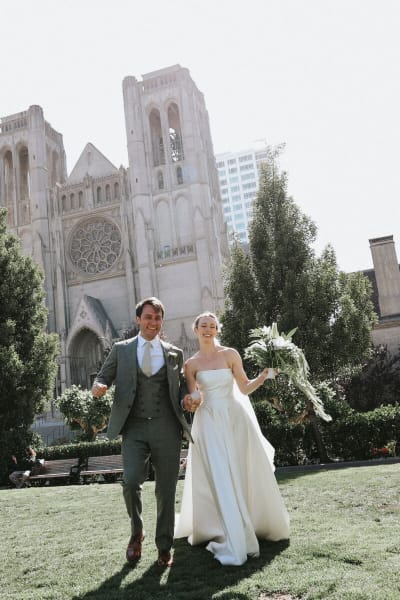 Laura, a Lace & Liberty bride, in her satin wedding dress