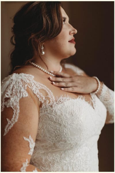 Nikki, a Lace & Liberty bride, in her long sleeve wedding dress