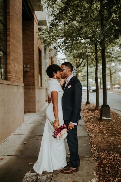 Shamyra, a Lace & Liberty bride, in her simple wedding dress