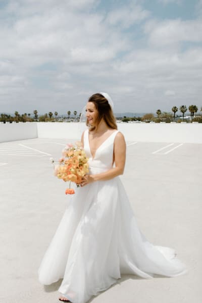Shelby, a Lace & Liberty bride, in her simple wedding dress