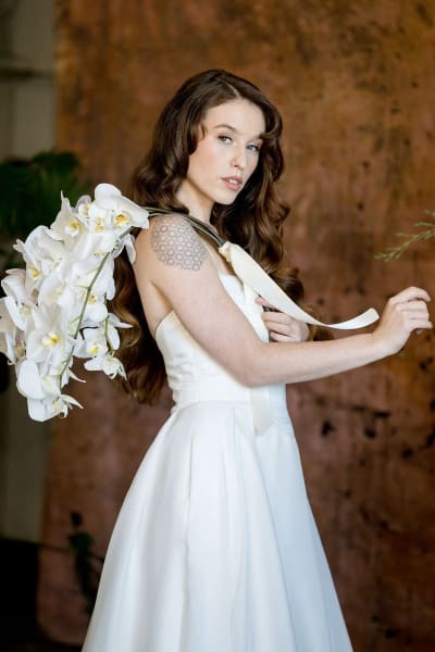 The Idra wedding dress bodice, side view