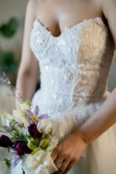 Close-up of the Heather's hand-beaded lace bodice and basque waist