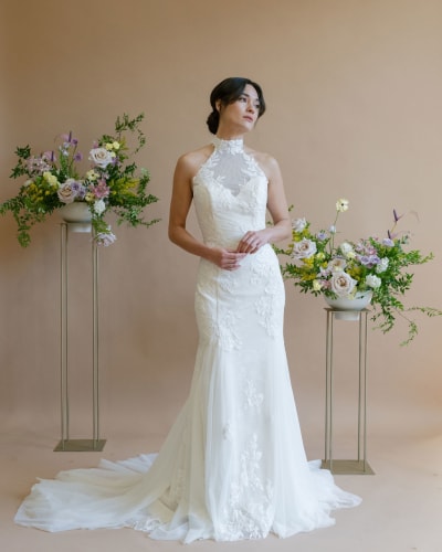 Bride wearing halter gown fitted silhouette