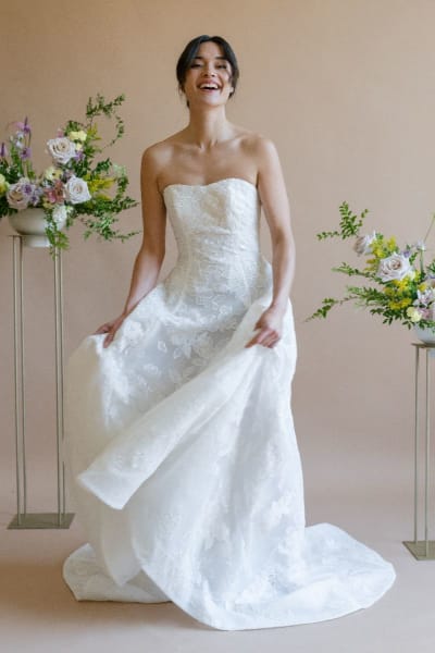 A-line wedding dress featuring a fitted bodice that flows into a voluminous skirt
