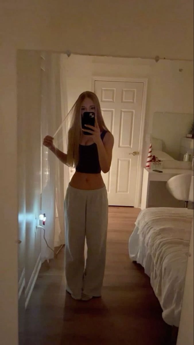 Beautiful UK Gym Girl posing in stylish gym outfit
