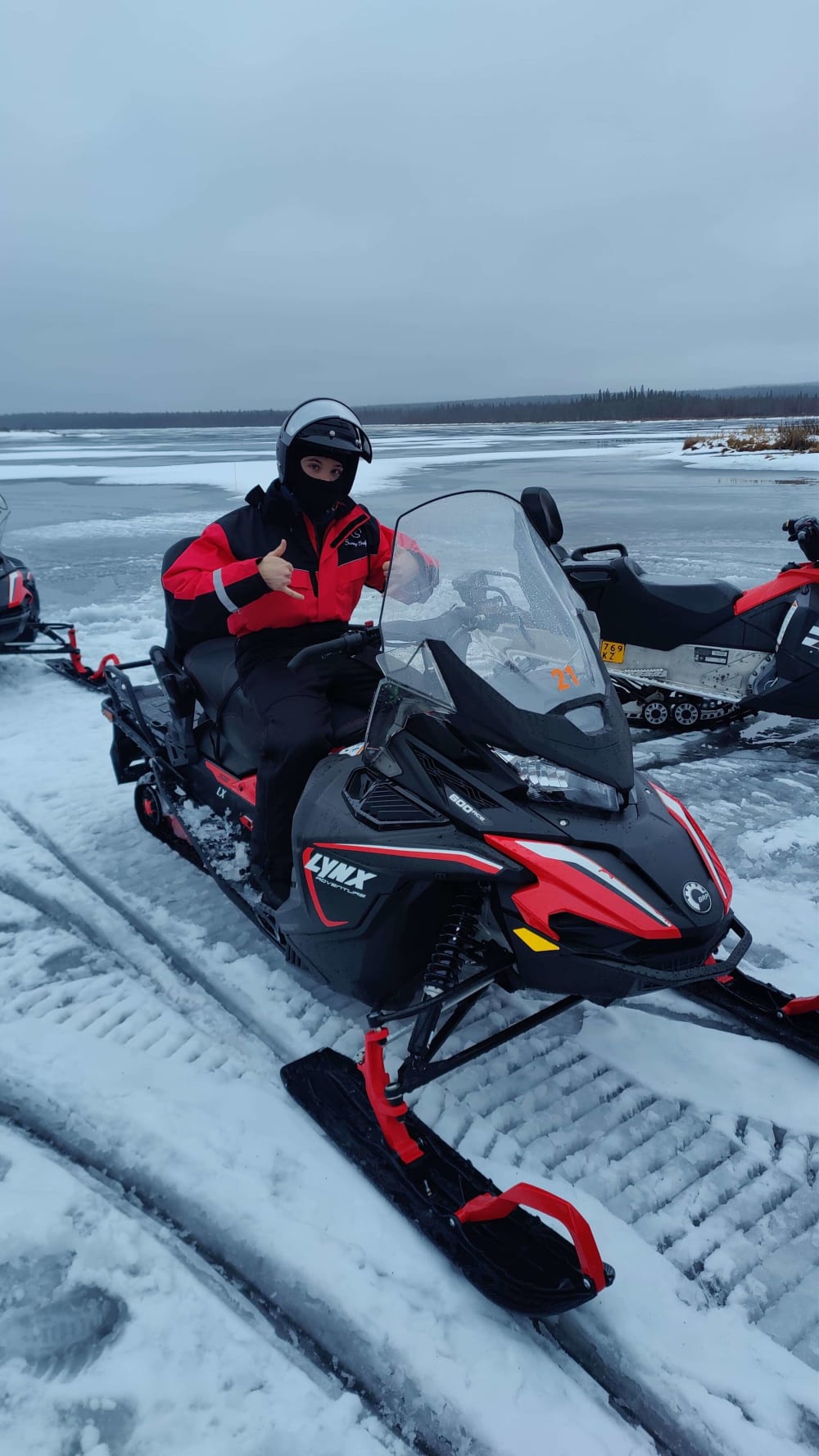 went to lapland, did snowmobiling on watery lake