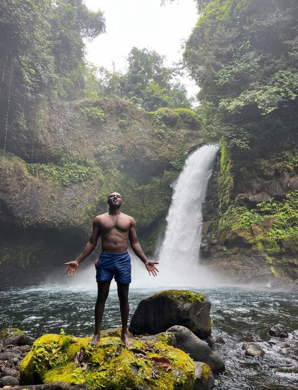 A beautiful scenery of bomana waterfall in pure nature