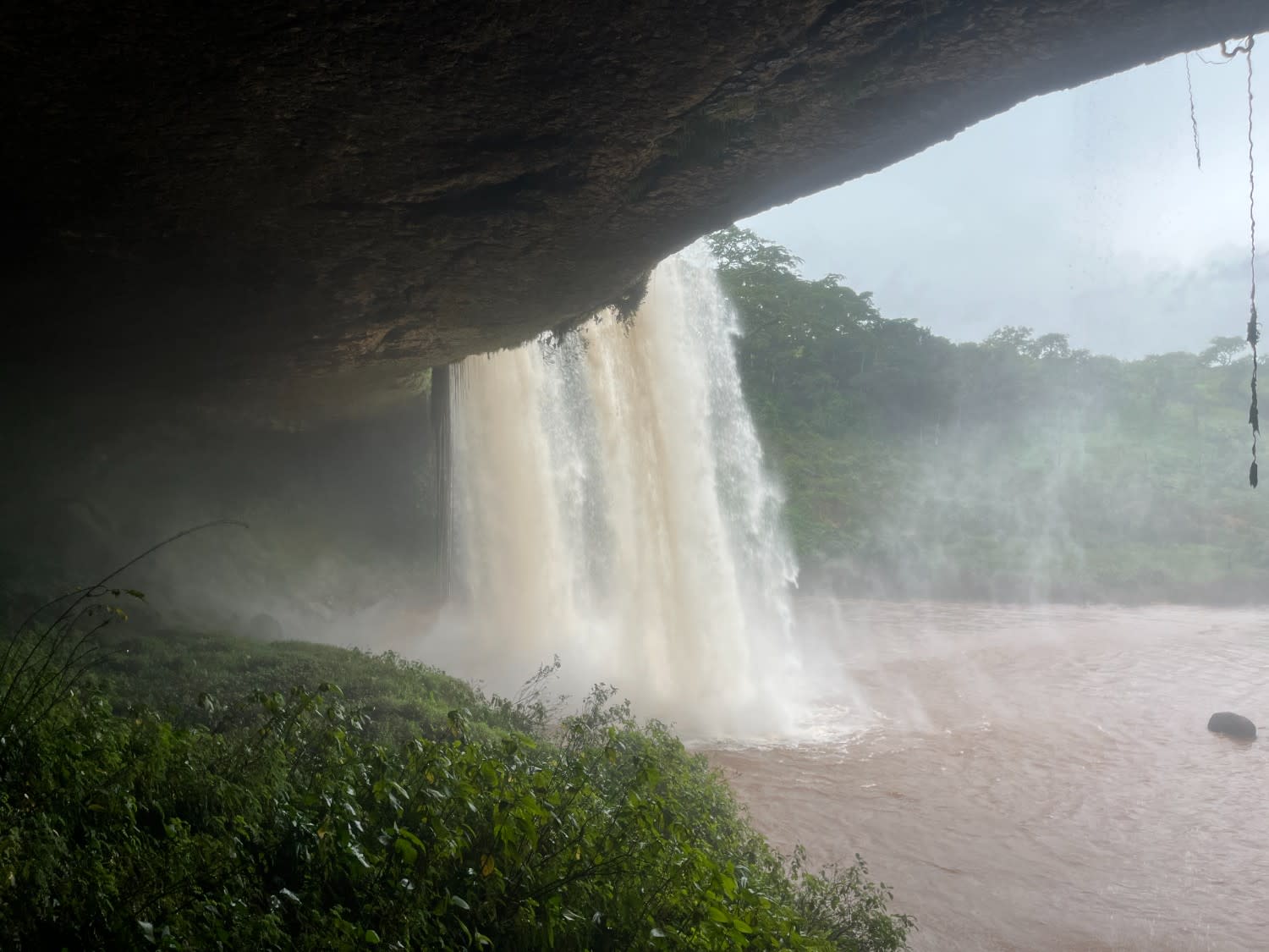 a beautiful view of Tello waterfall from the cave