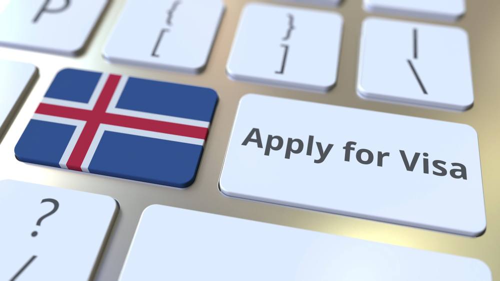 Keyboard with an Icelandic flag key beside an “Apply for visa” button, illustrating Iceland visa requirements for travelers from the United States.