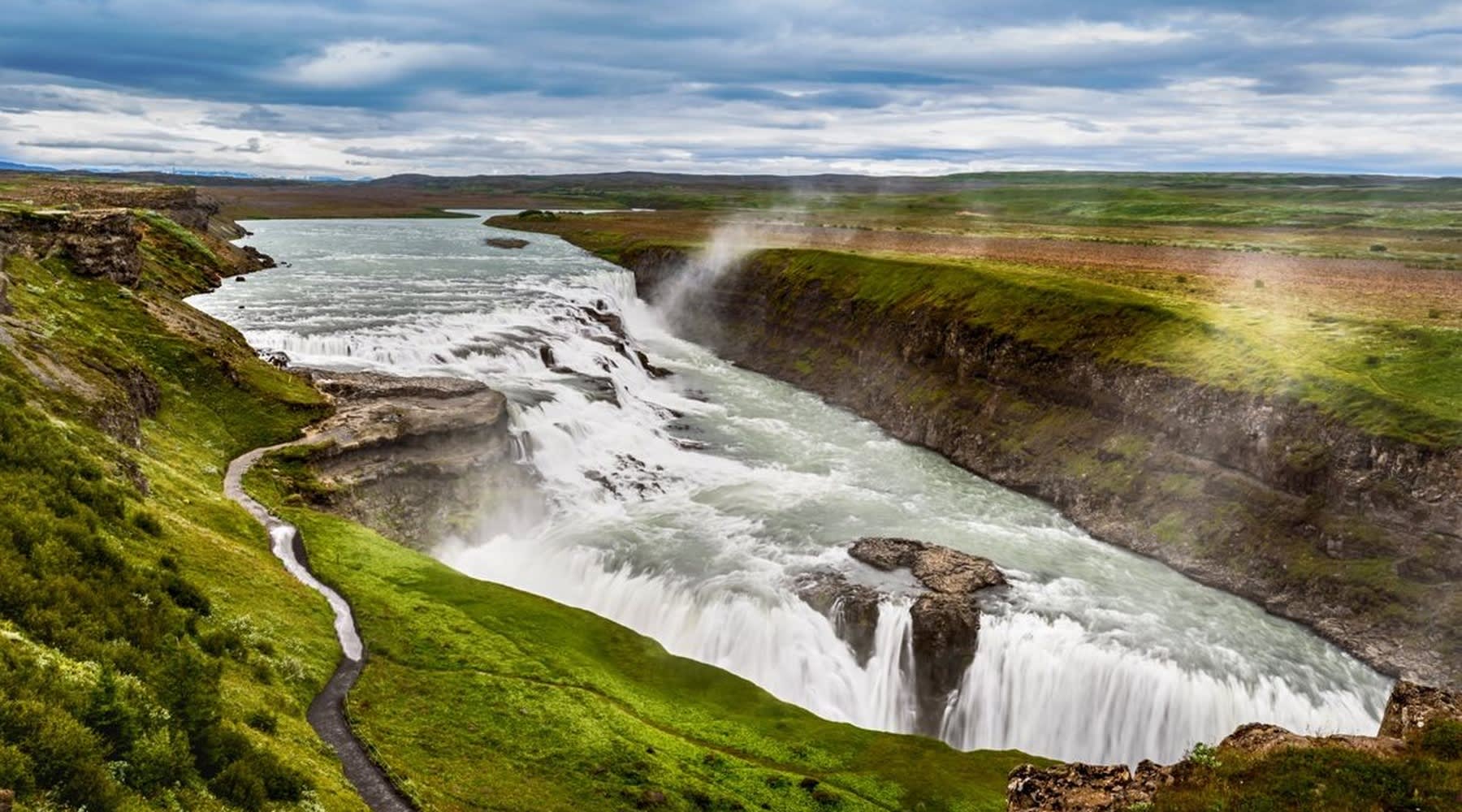 Gullfoss waterfall surrounded by Icelandic moss.