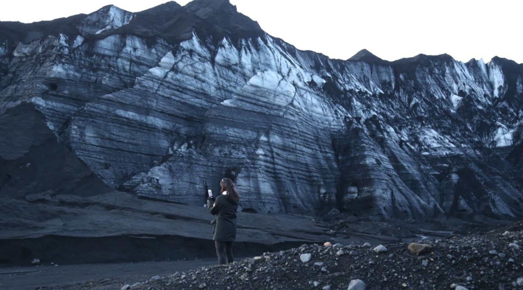 Mountain covered in snow and ash in Iceland.