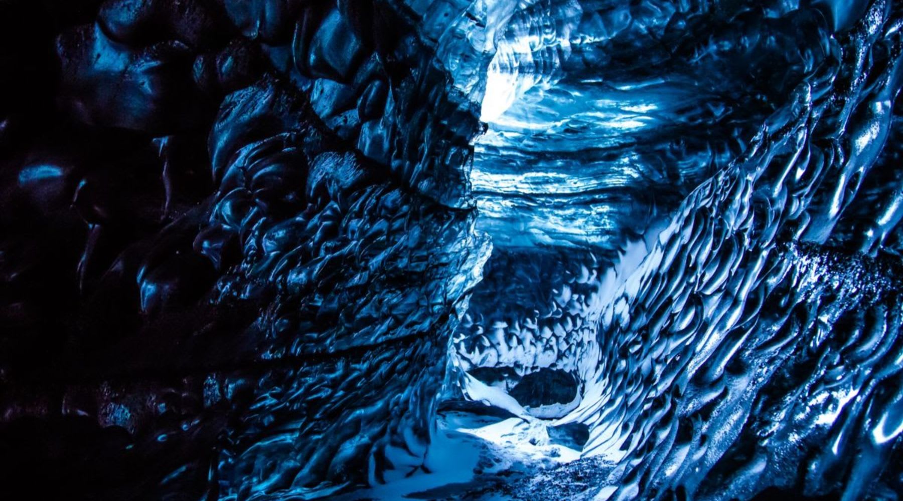 Intense blue hues of an ice cave in Iceland.