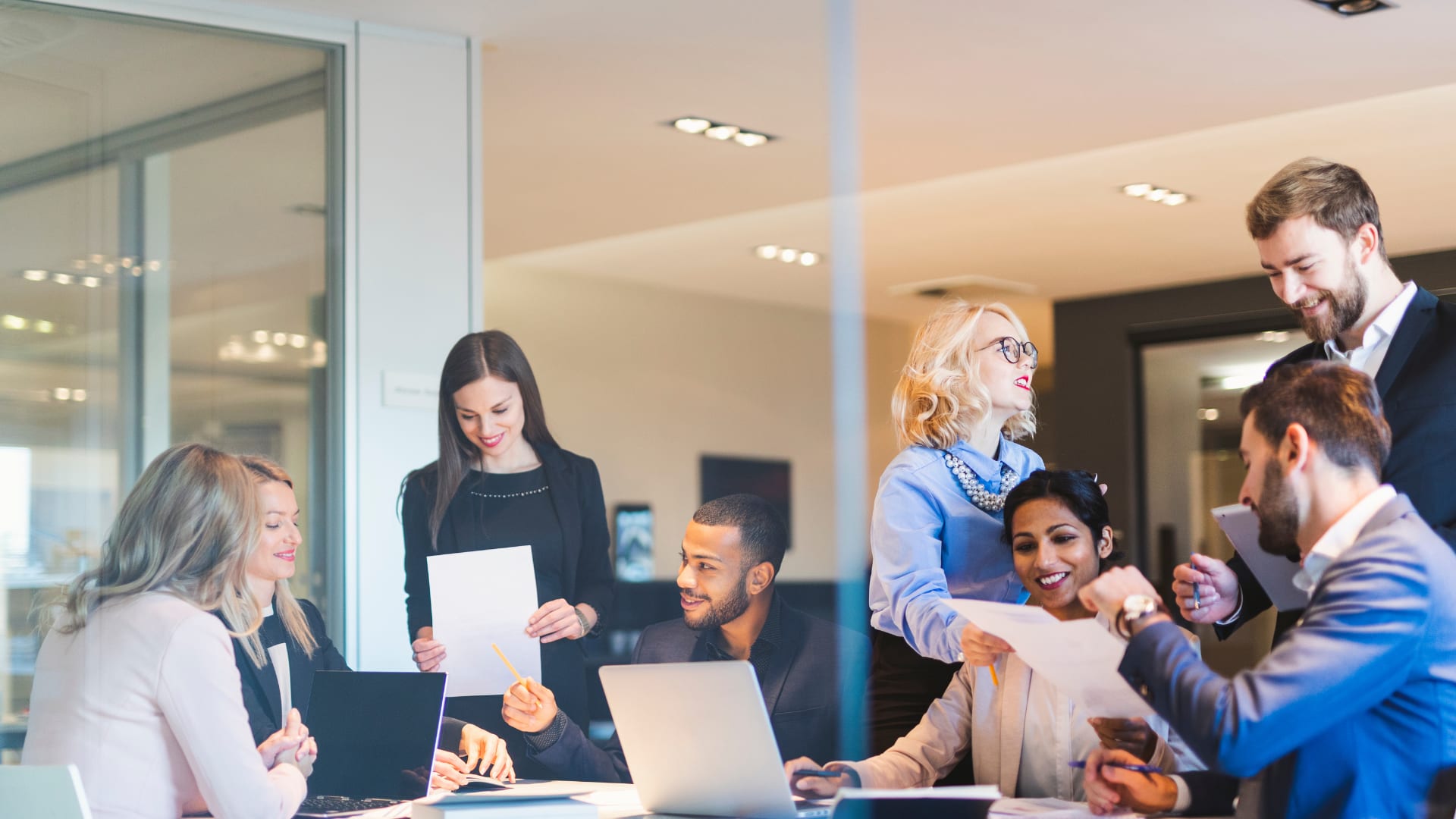 A group of people in a meeting