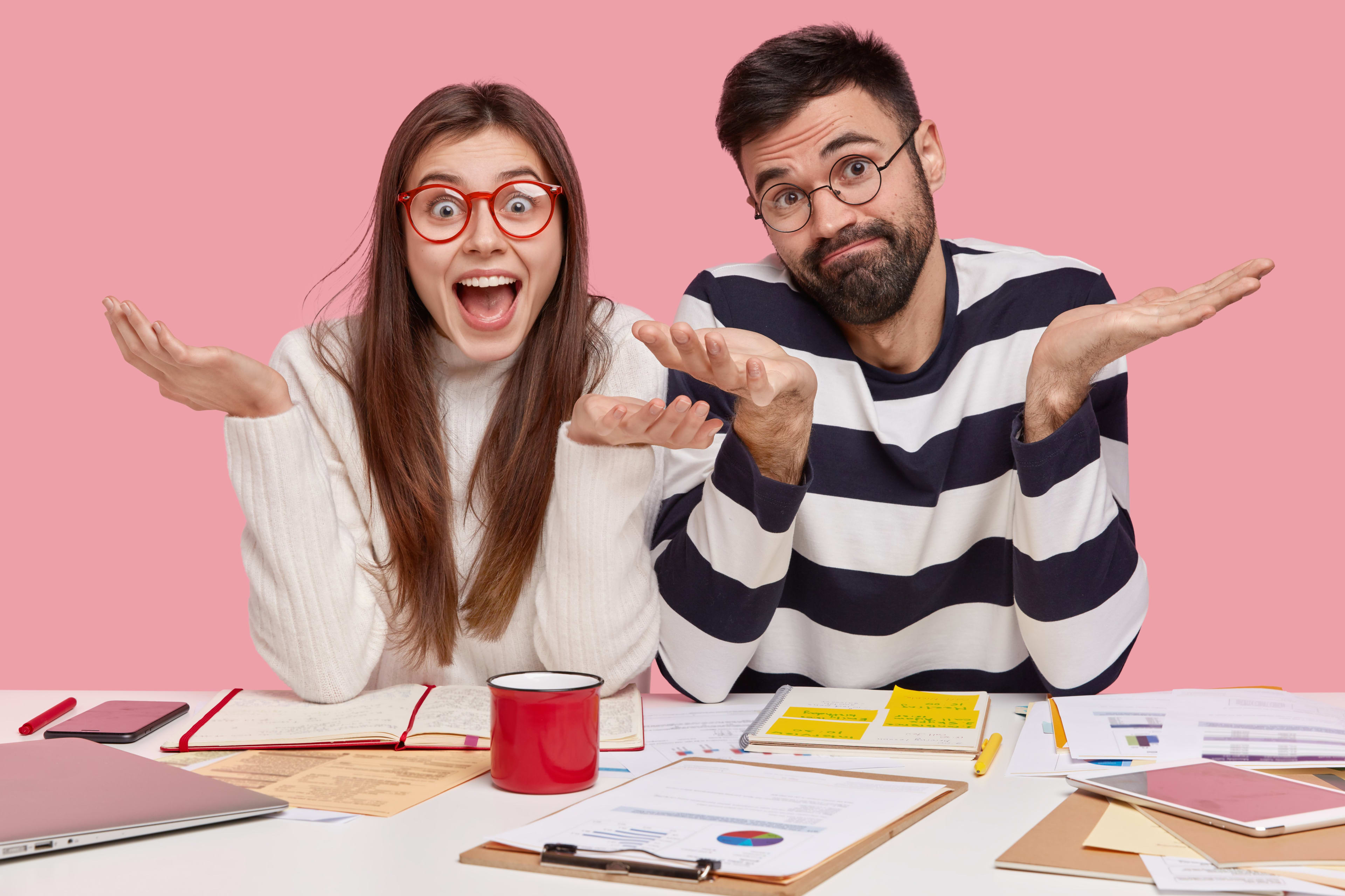 Enthusiastic coworker with introvert, confused coworker