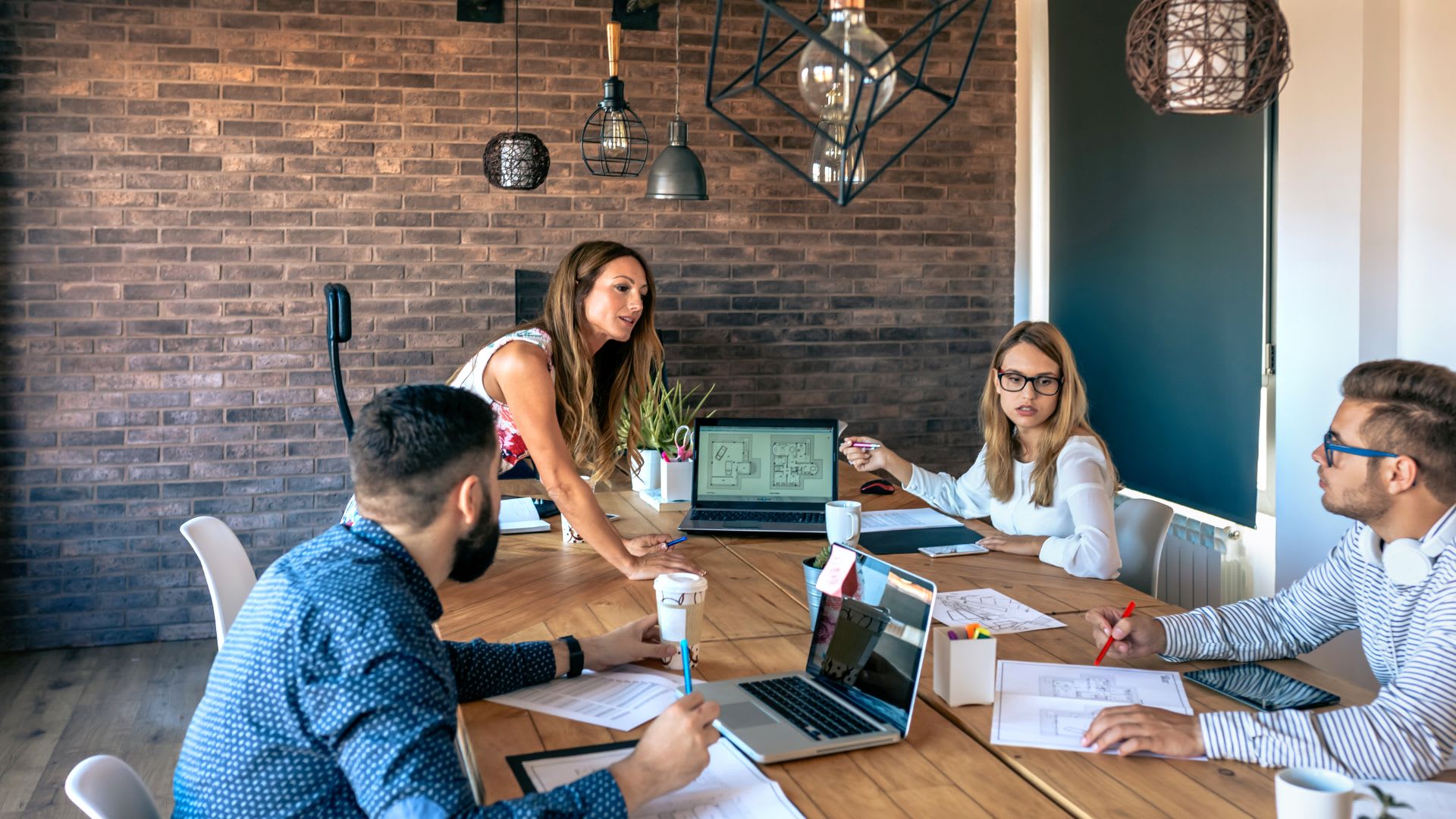 People collaborating in a workplace setting. 
