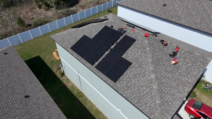Solar panels being installed on a Florida home rooftop