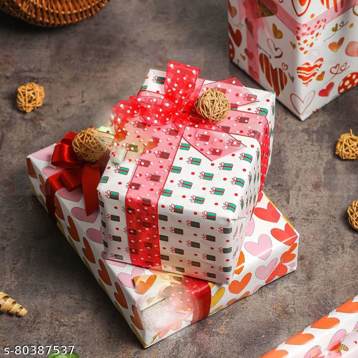 Heart-shaped KitKat chocolate birthday gift with gold bow