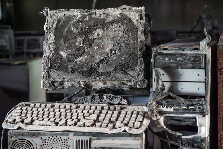 bigstock-Personal-Computer-burnt-92187464