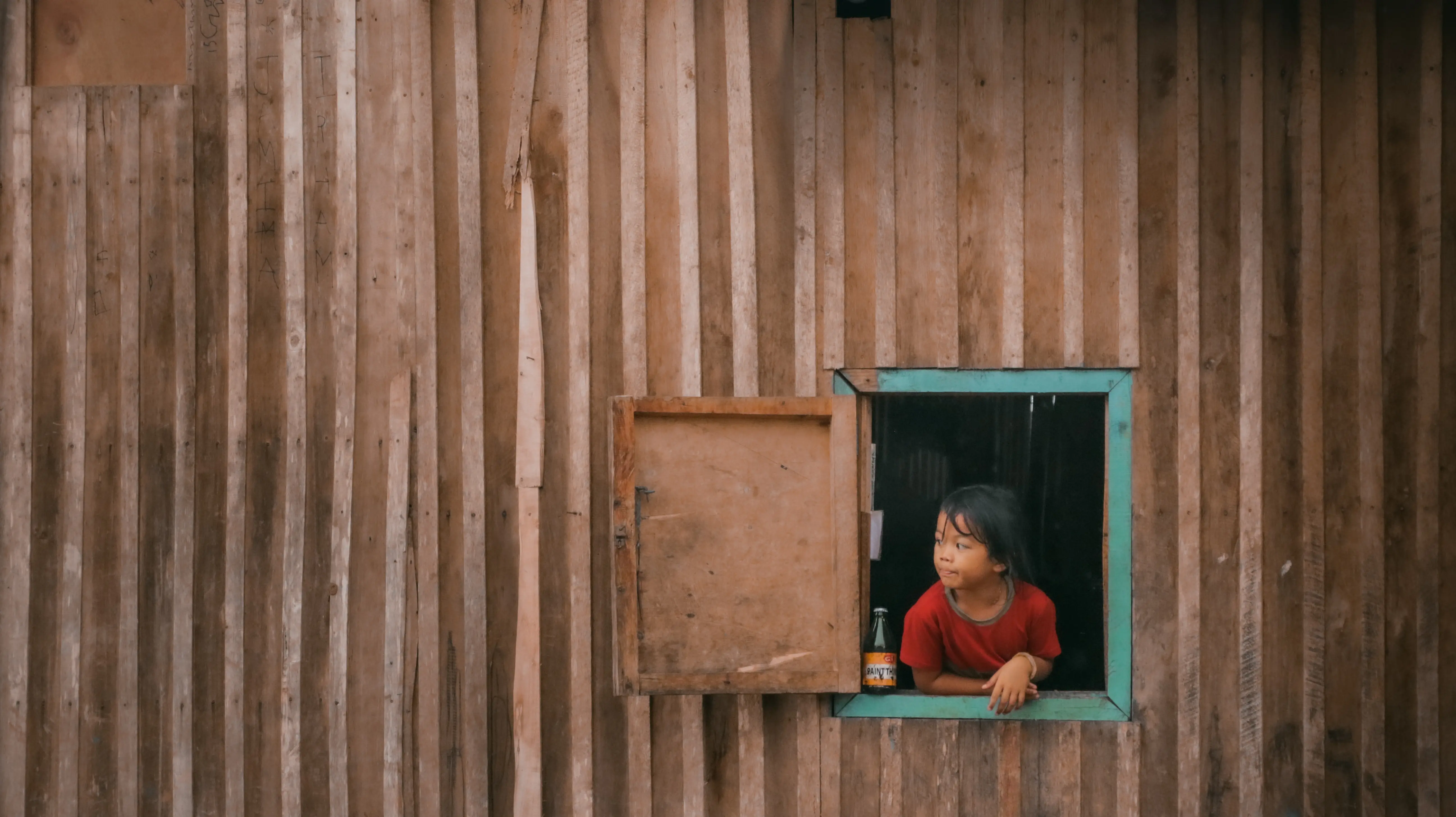 Homefront - Curiosity framed by shelter - Photography by Ryan Walloh