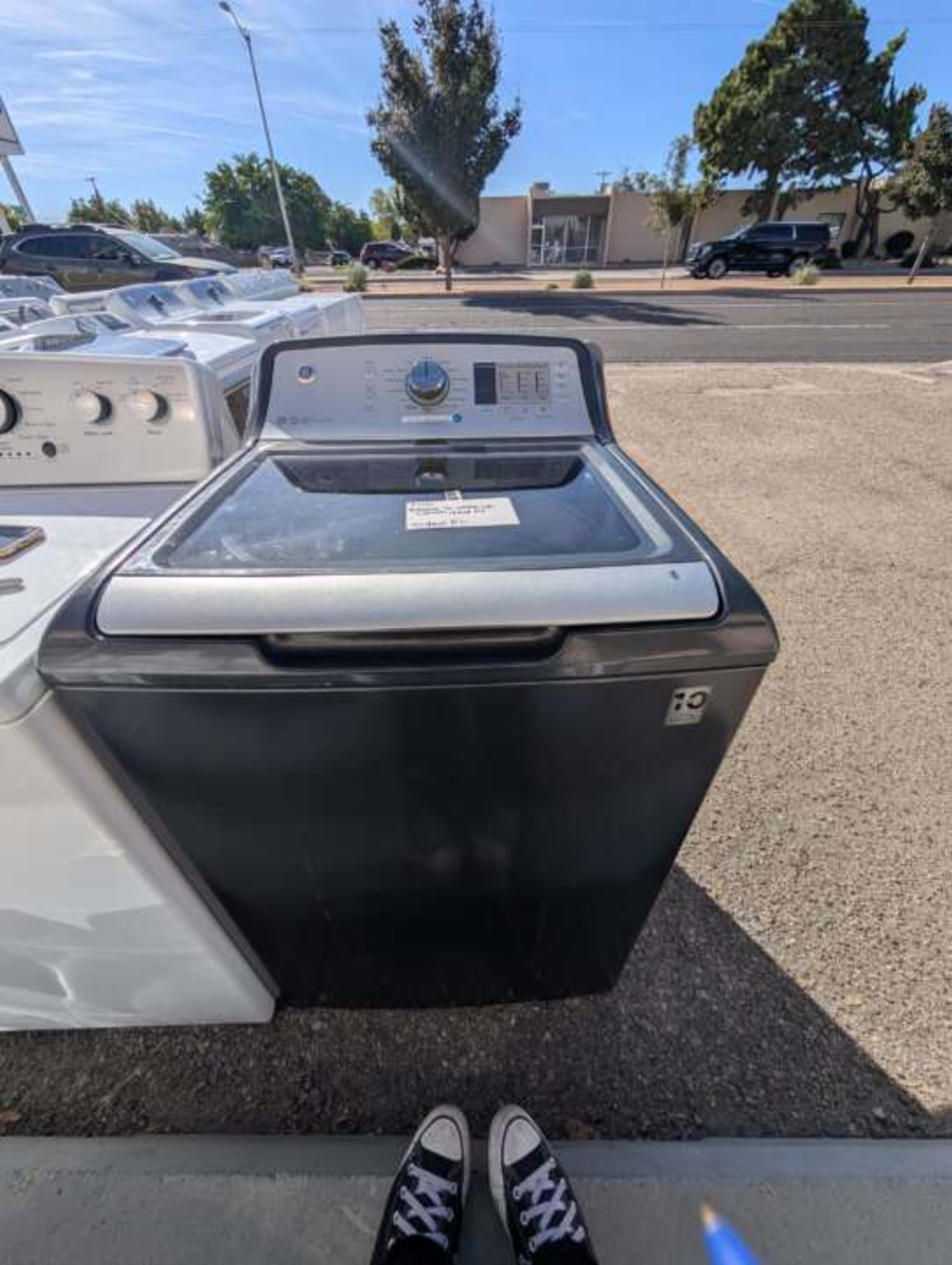 Gray GE Top Load Washer Without an Agitator and With deep fill