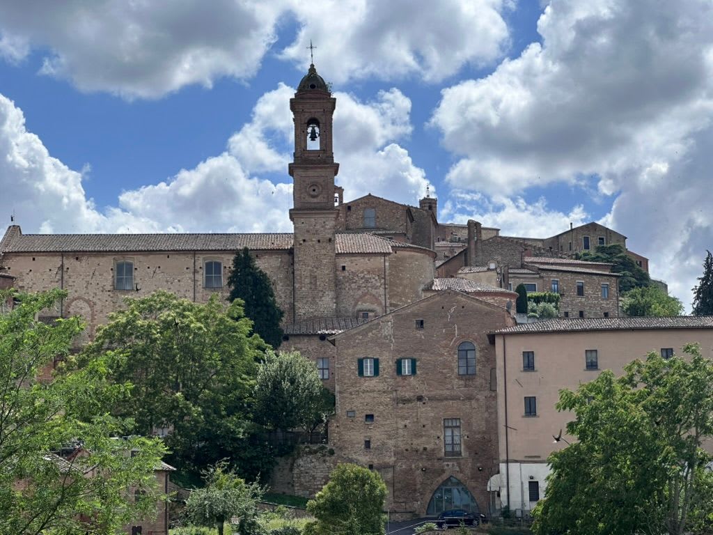 A church and bell tower on Montepulciano's skyline