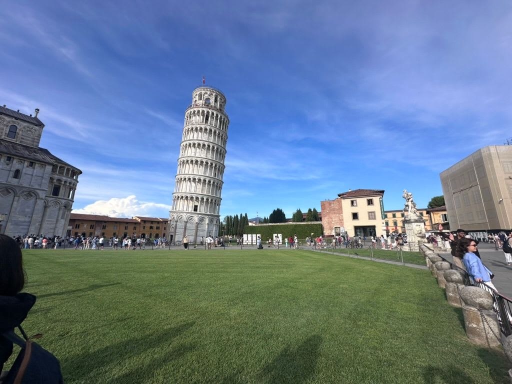 The Leaning Tower of Pisa from the lawn of the Campo dei Miracoli