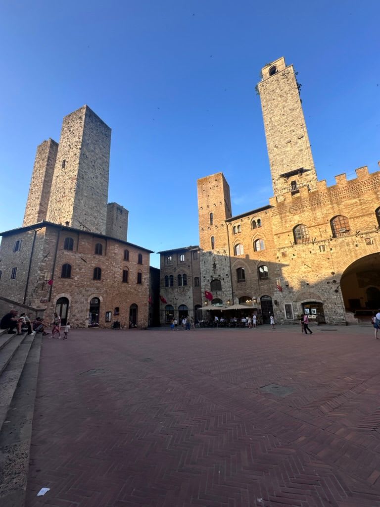 The twin towers of San Gimignano against a summer sky