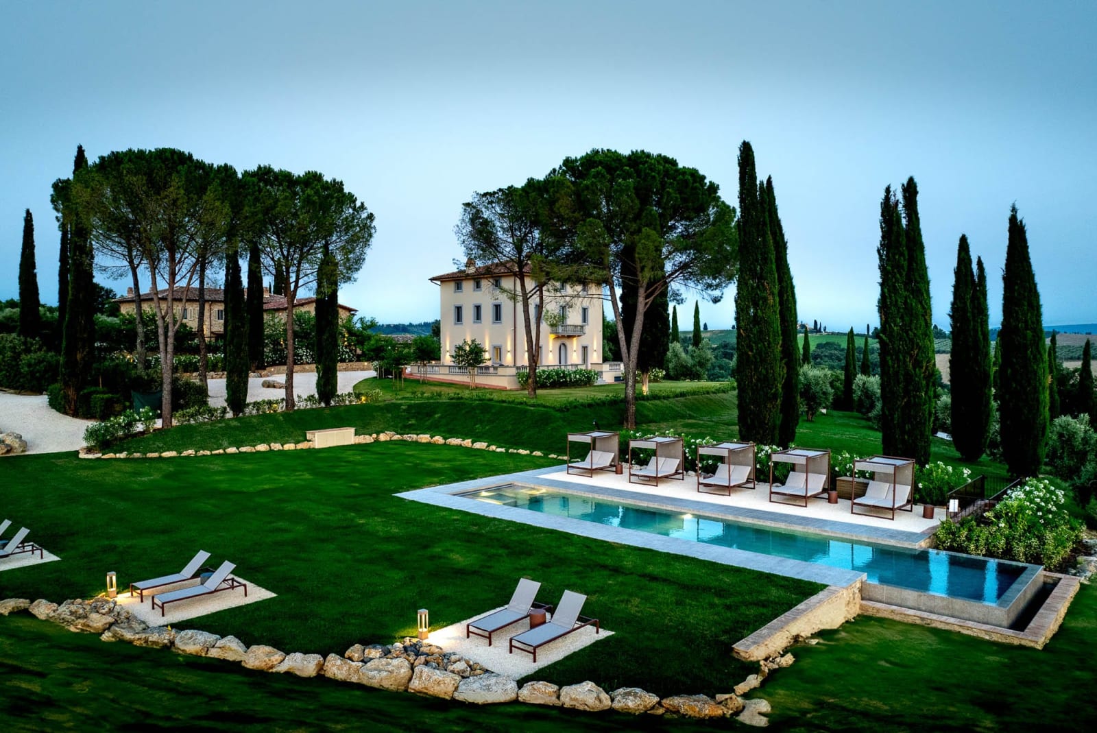 Tenuta Belvedere Estate: Tenuta Belvedere — the villa above its saltwater pool and lawns