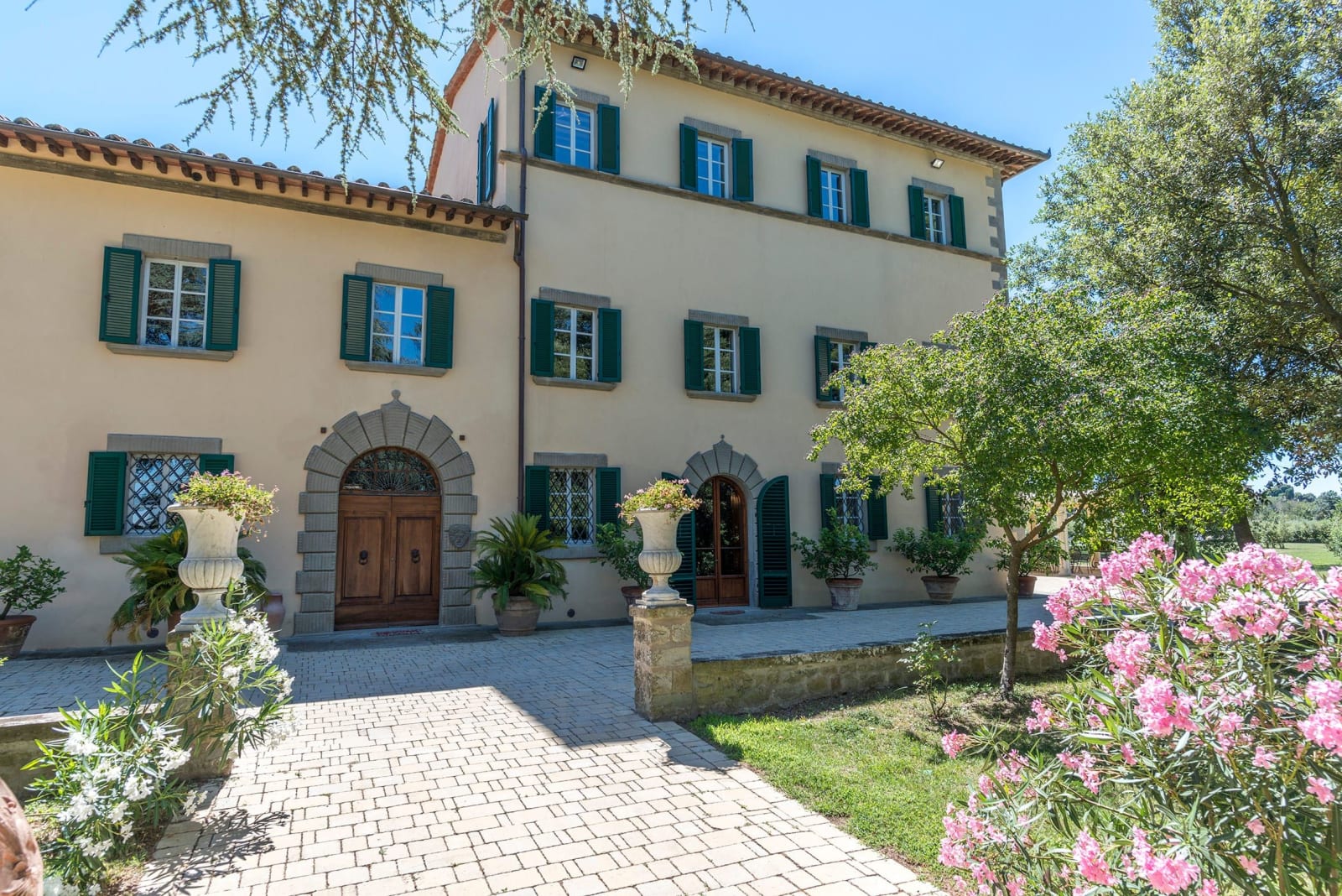 Villa della Cappella — the villa's facade and entrance garden