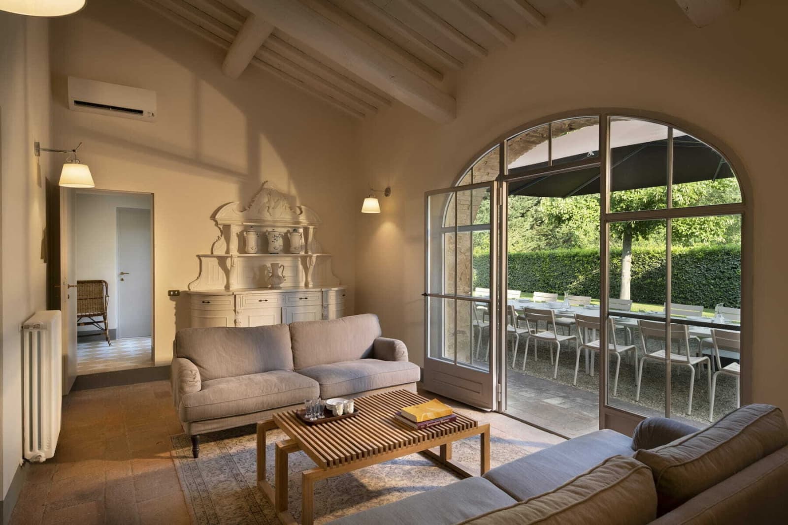 Villa Erbavoglio — a living room opening onto the terrace