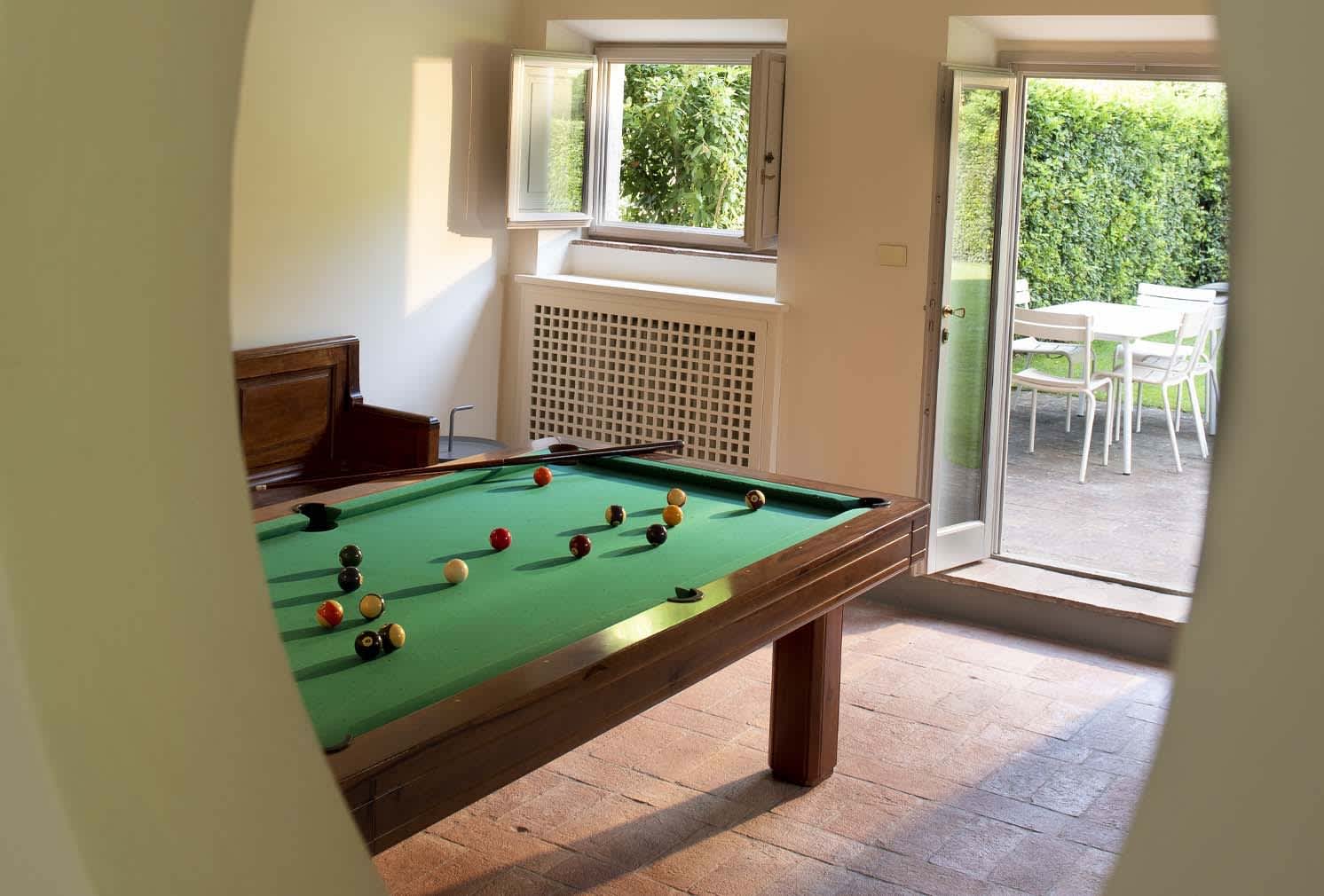 Villa Erbavoglio — the billiards room opening onto the terrace