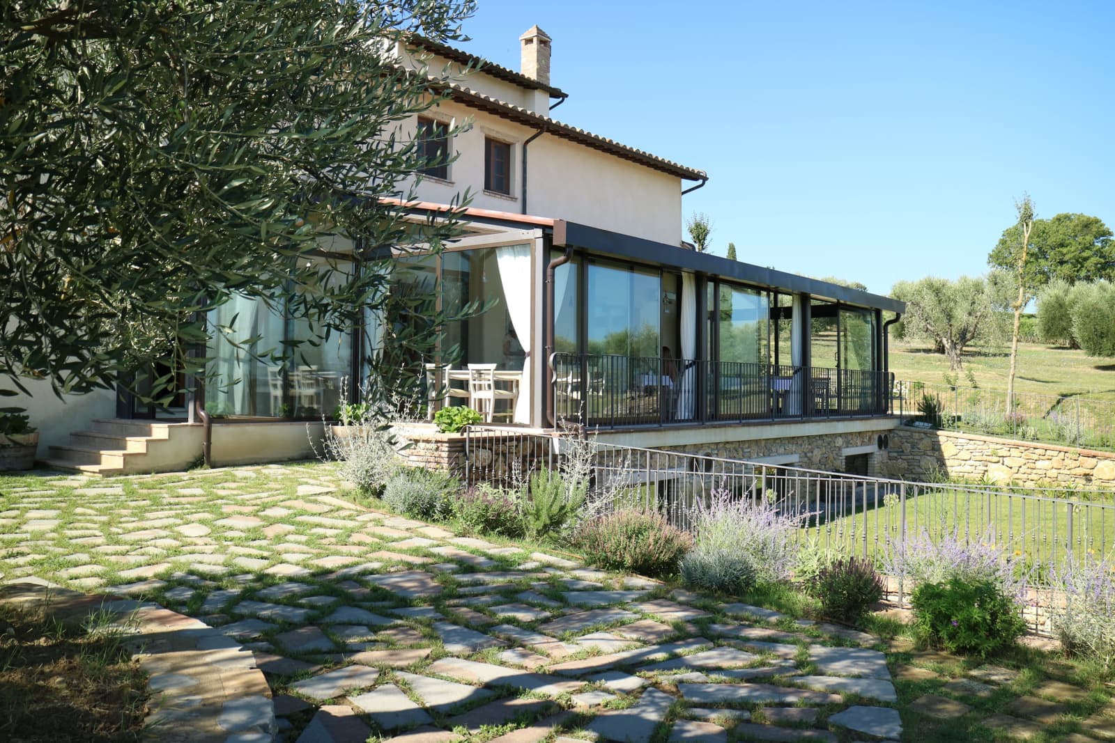 Tenuta La Barricaia — the glass veranda seen from the garden