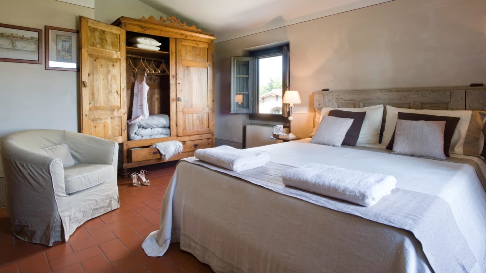 Villa Il Colto — a bedroom with the countryside beyond