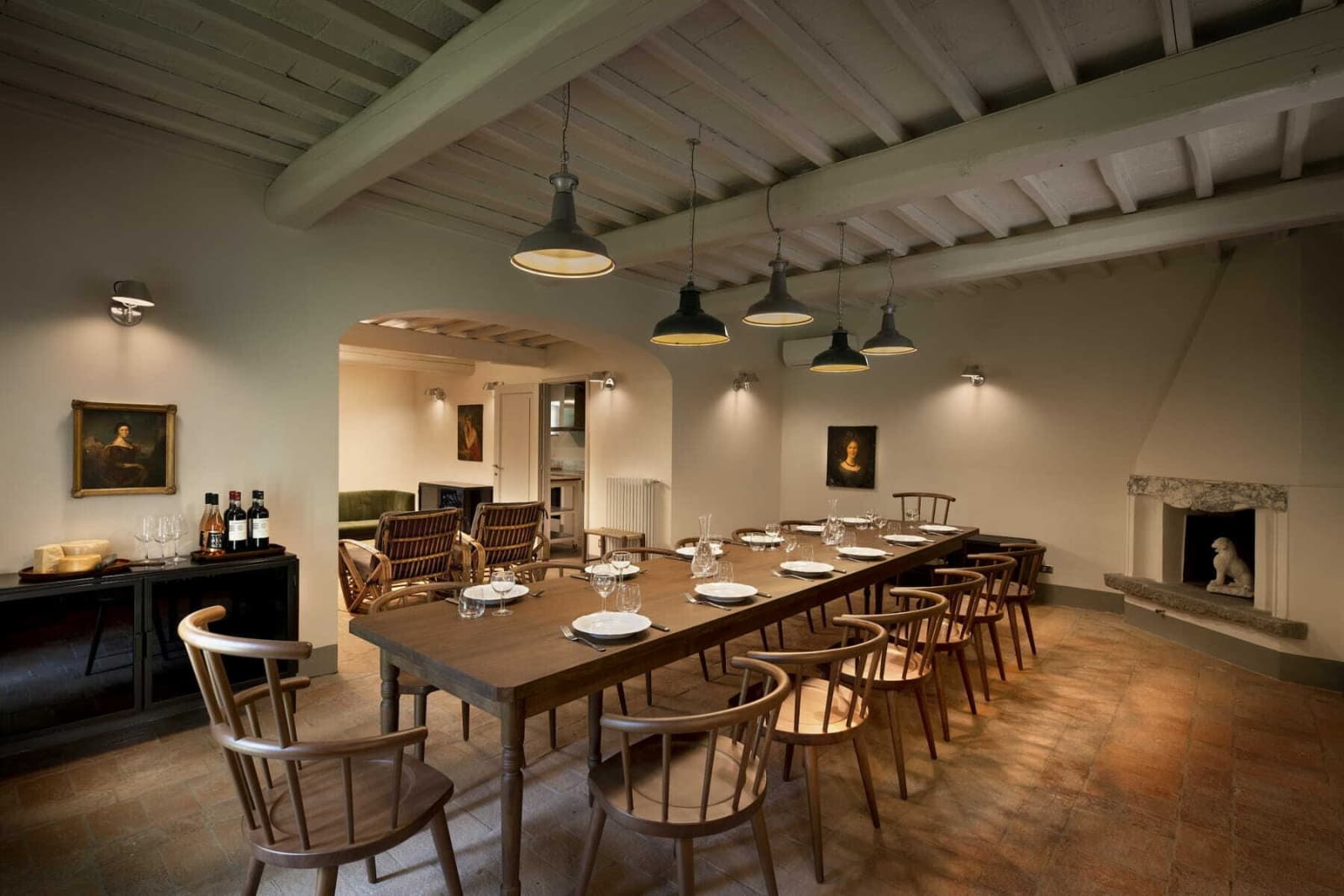 Villa Erbavoglio — a formal dining room with fireplace
