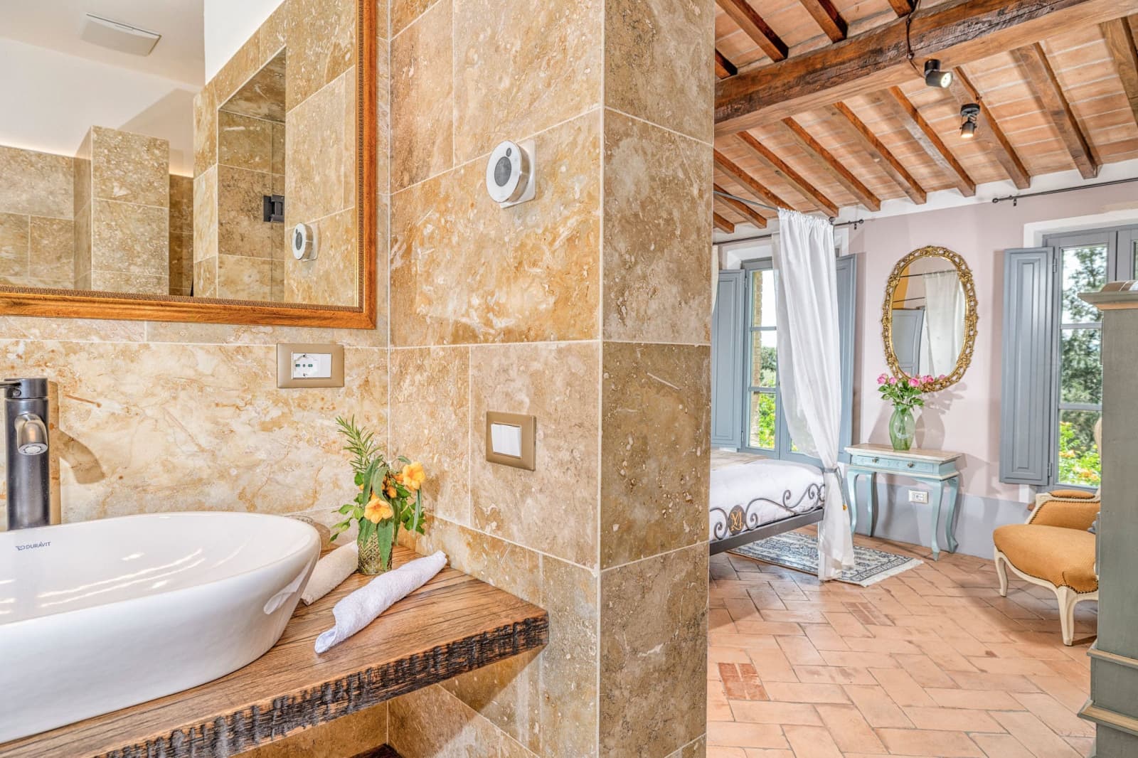 Villa Poggio d'Oro — a stone bathroom with a vessel basin