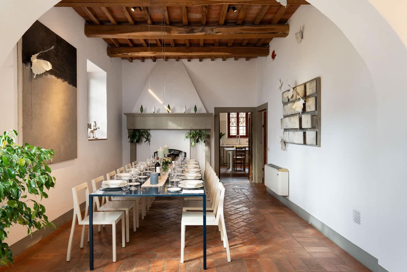 Villa Castellaro — the long dining hall laid for a dinner