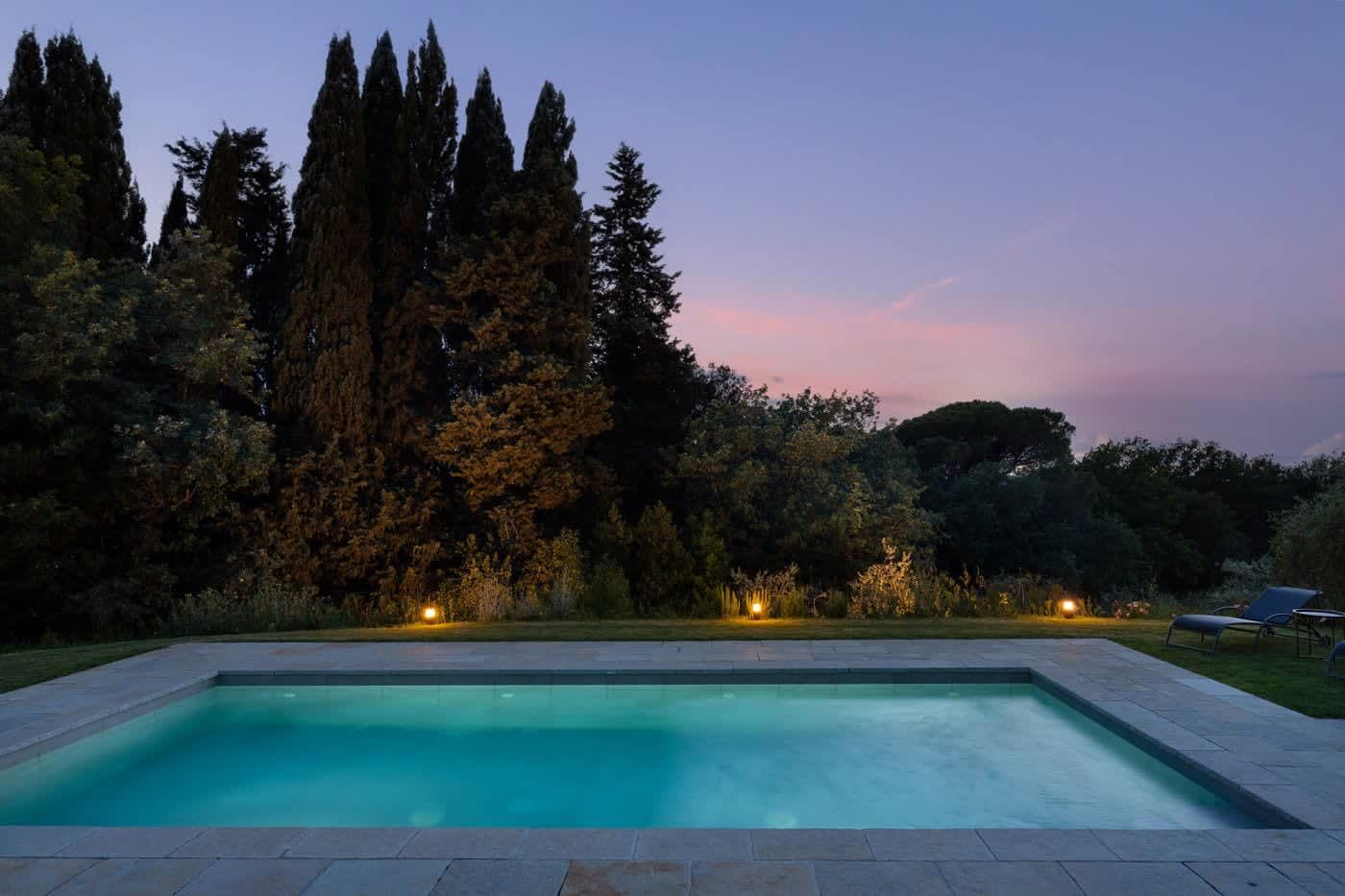 Casa Lilia — the pool under an evening sky