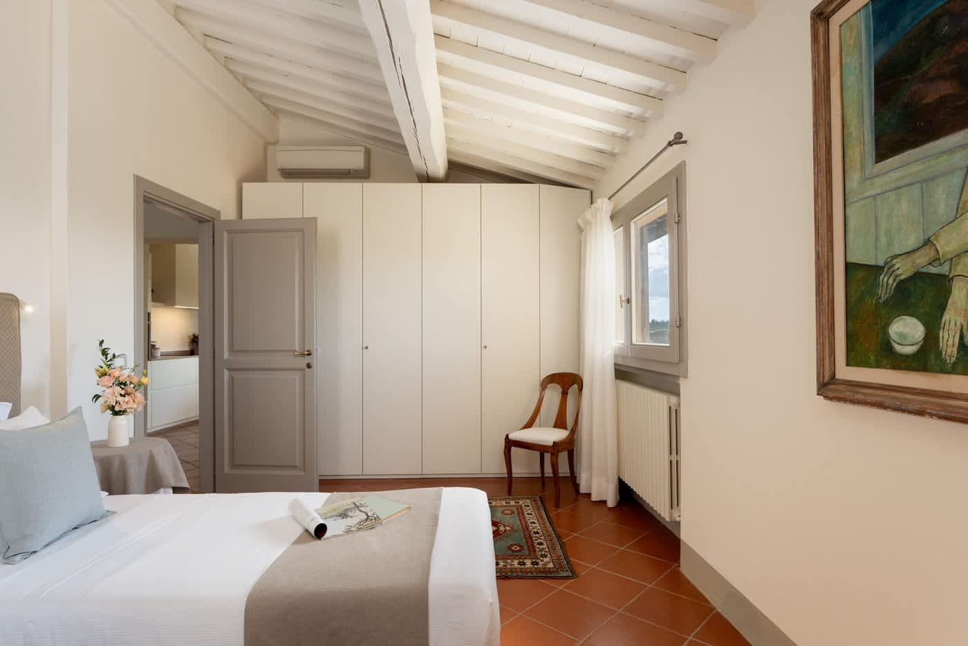 Casa Lilia — a bedroom with built-in wardrobes